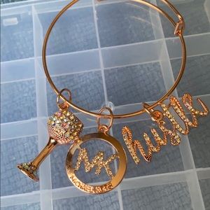 Rose Gold bangle with charms